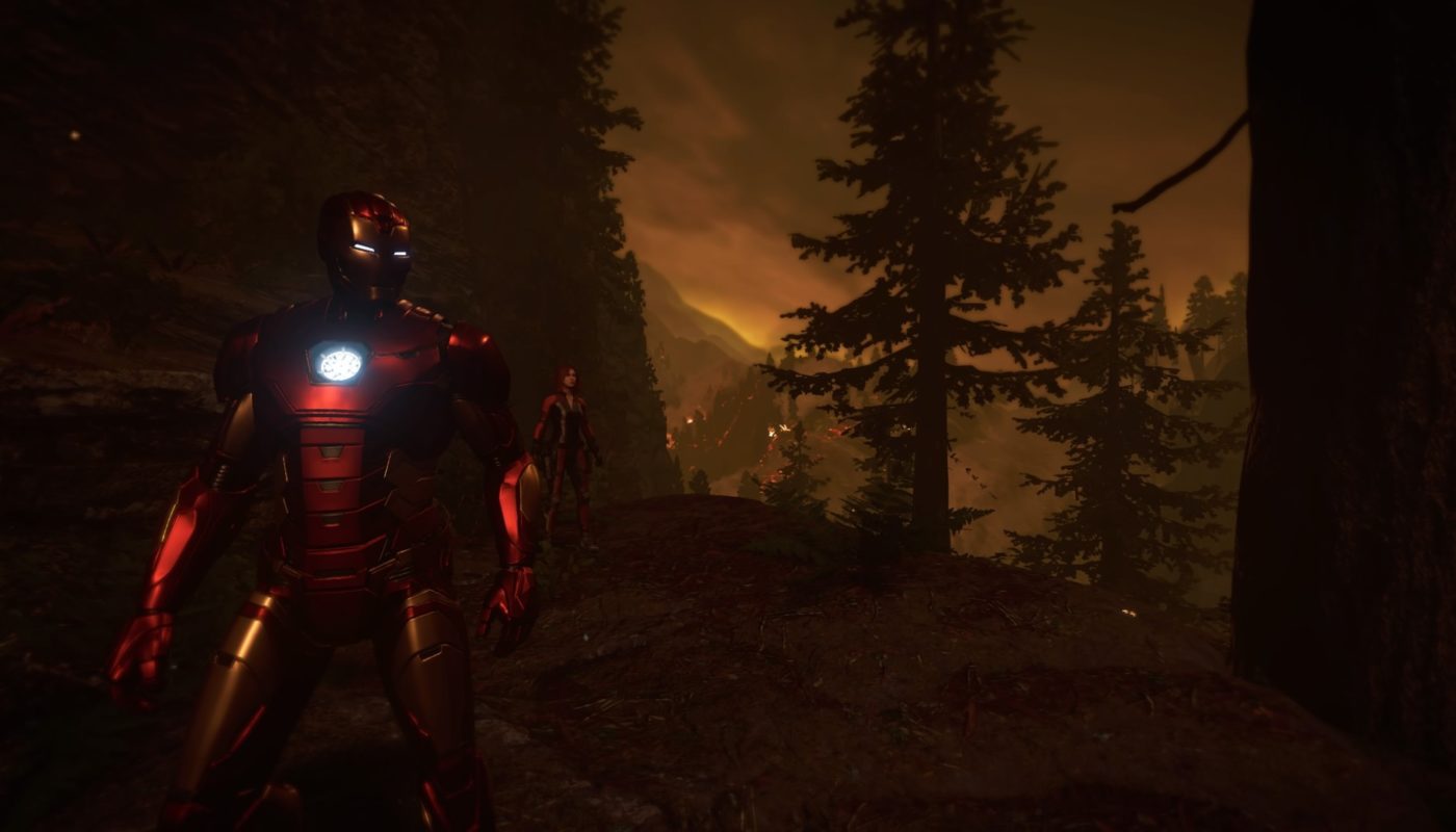 Iron Man and Black Widow stand in a forest at dusk.