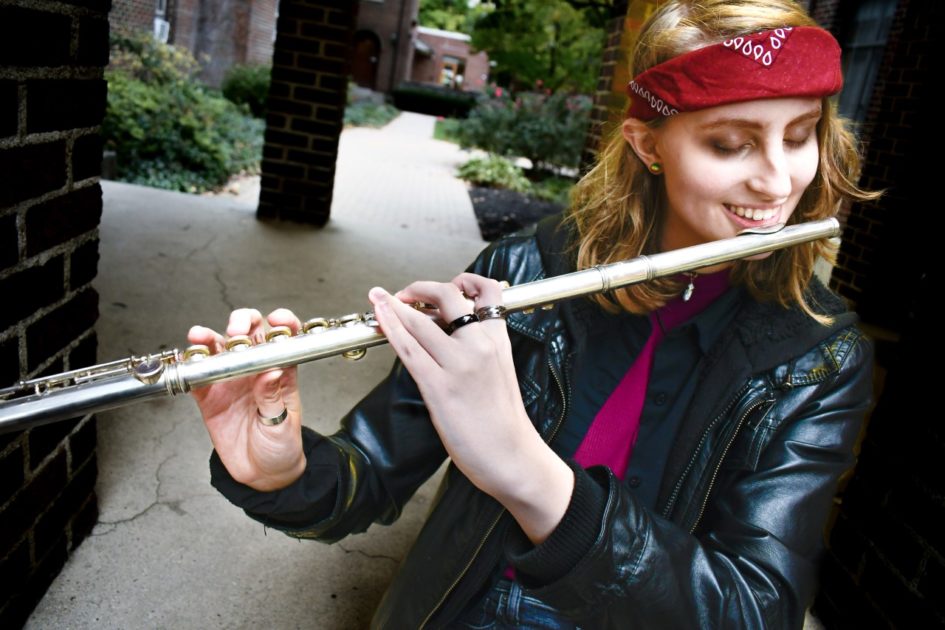 Hannah Kavanagh is shown playing an instrument.