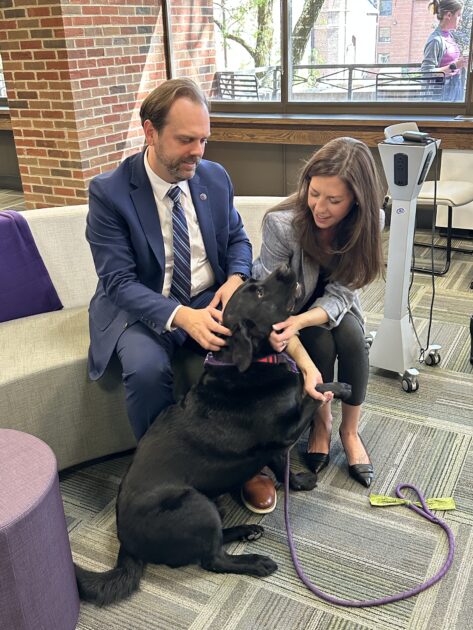 Capital University President and Archer the dog.
