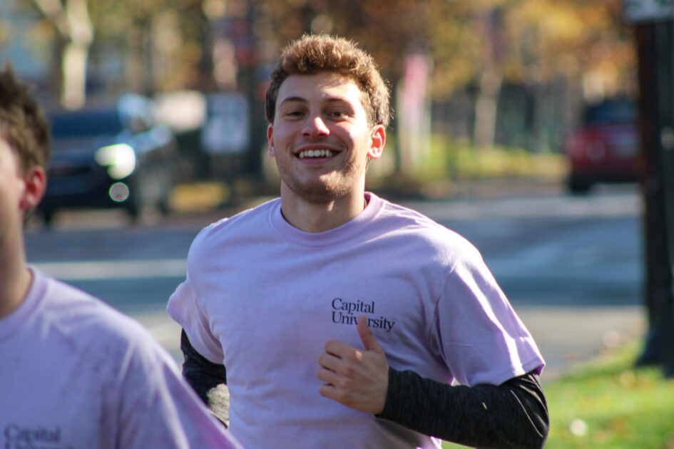 Student participant running the Turkey Trot. Photo by Riley Donovan.