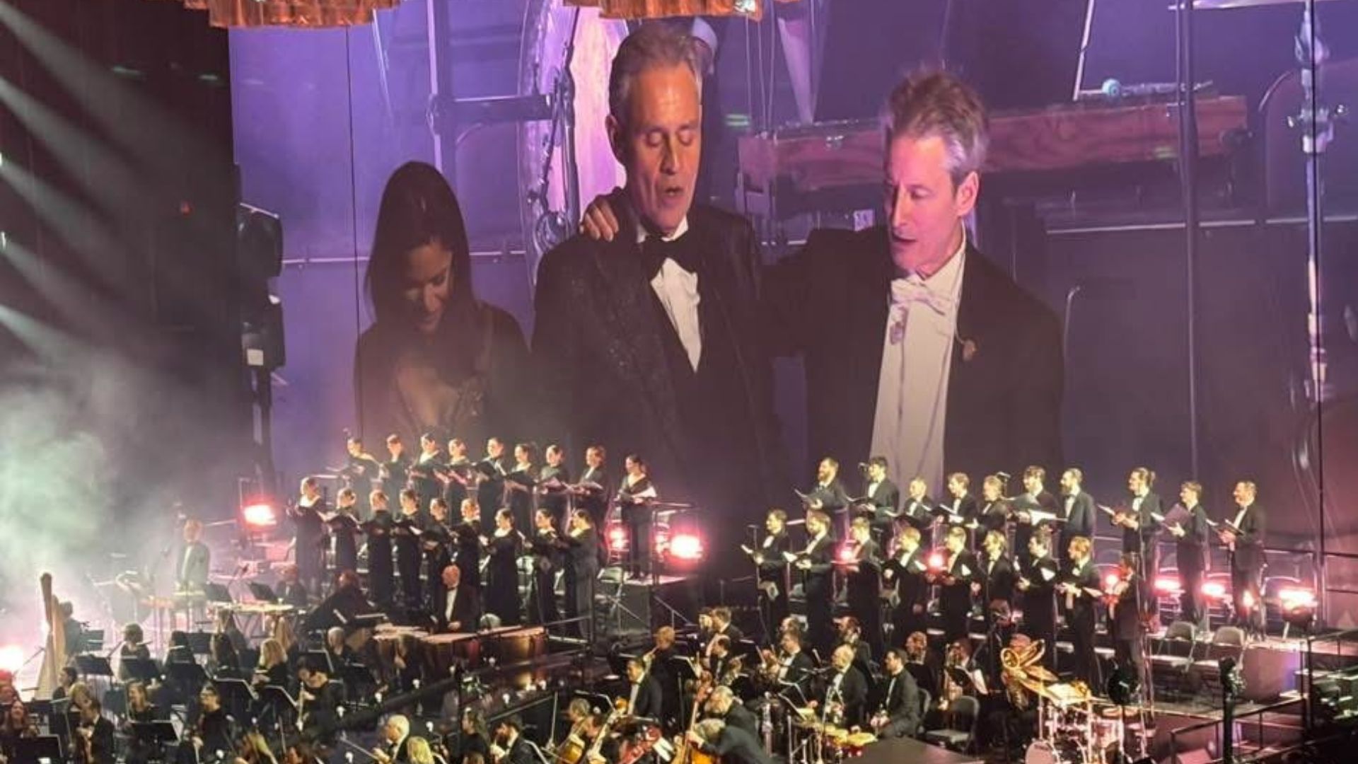 World-renowned opera singer Andrea Bocelli performs with university choir students